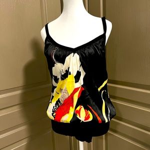 Versatile piece by Bebe. Wear it as a dress or a blouse.